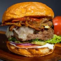 Bacon Burger · Loads of crispy bacon on a seasoned half-pound angus patty, perfectly cooked to medium on a ...