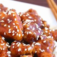 Sesame Chicken · Crispy fried White meat chicken.with steamed broccoli stir fried with sesame sauce