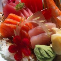 Chirashi Sushi · Assorted fresh raw fish over vinegar rice.