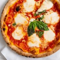 Regina Margherita Pizza · San Marzano tomato, basil, and house-made mozzarella.