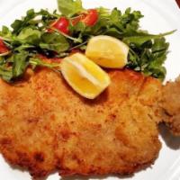 Veal Milanese · Pounded 16 Oz veal chop, bone-in. Crisped with arugula salad.
