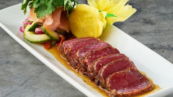 Seared Ahi-Tuna · Complemented by a spirited sauce with hints of mustards and beer