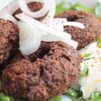 Falafel (12 Pieces) · Ground chickpeas mixed with our special blend of herbs.