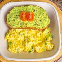 Avocado Toast With Scrambled Eggs · Served with coffee and toast.