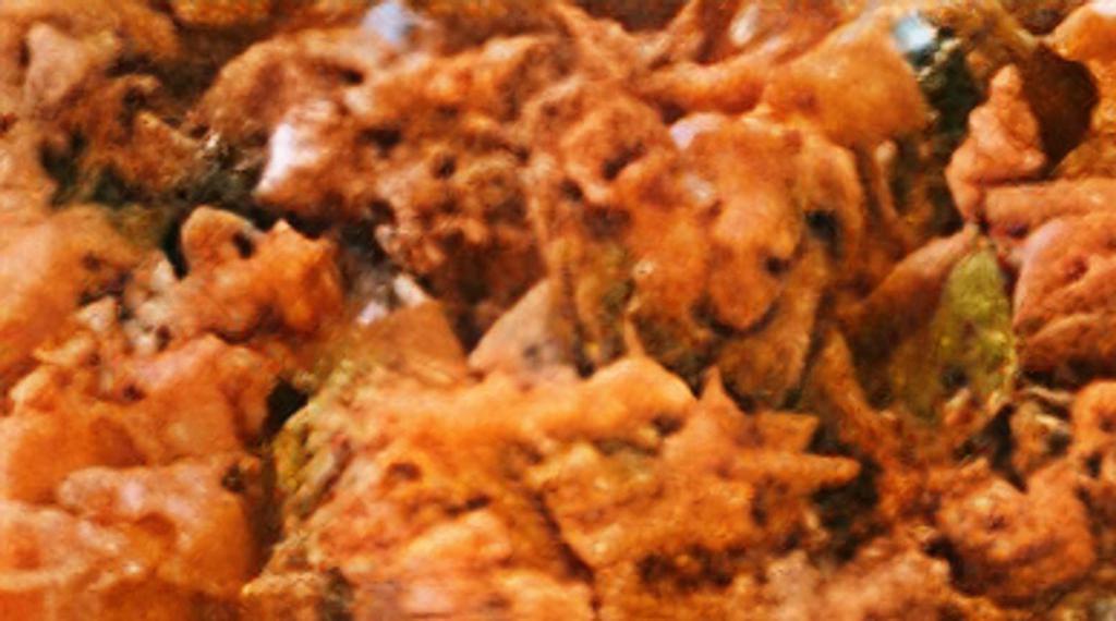 Onion Pakora · Onions dipped in chickpeas batter and deep fried.