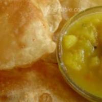 Puri Bhaji · Vegetarian. Whole wheat bread deep fried and fluffy. Served with potato masala.