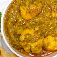 Chicken Pepper Curry · Tender chicken pieces cooked with freshly crushed black pepper.