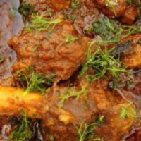 Goat Masala · Pieces of mutton cooked in finely ground masala, traditional Chennai masala.
