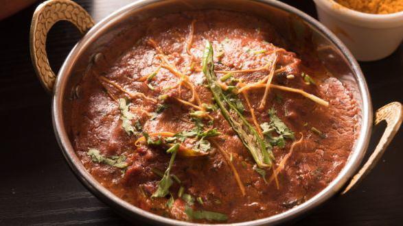 Kadai Lamb · Succulent pieces of lamb cooked with onion, tomato, and green pepper.