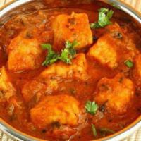 Nellore Chepala Pulusu (Fish In Tamarind Gravy) · Fish marinated with spicy tamarind paste cooked in thava with spices.