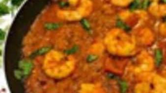 Shrimp Masala · Shrimp sauteed with ginger, garlic, onion, and tomatoes in a semi-dry gravy.