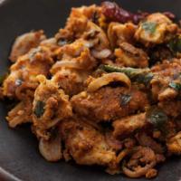 Chepa Vepudu (Fish Fry) · Fish marinated in spices and fried.