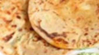 Aloo Paratha · Potato stuffed bread.
