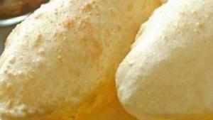 Batura (1 Pc) · Deep-fried puffed white flour bread.