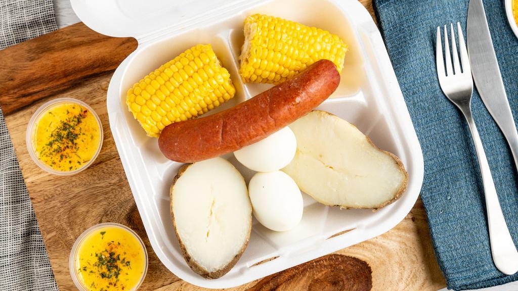 Side Tray · Four eggs, two corn, two potatoes.sausage.
