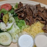 Gyros Plate · Seasoned blend of thinly sliced beef and lamb served with tzatziki sauce, rice, salad, and p...
