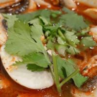 Tom Yum · Choice of chicken, shrimp or tofu Thai style hot and sour soup with mushroom, lime juice, to...