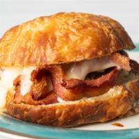 Smoked Ham And Swiss · Freshly baked giant croissant with light mayo/ Black Forest ham and Swiss cheese.