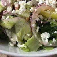 Greek Salad · Gluten-Free. Romaine lettuce, kalamata olives, red onions, cucumbers, Roma tomatoes, feta ch...