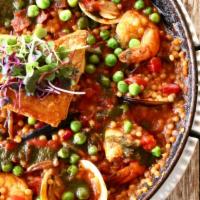 Seafood Paella *Nut Allergy · Toasted Israeli couscous, walnut pesto, calamari, mussels, clams, gulf shrimp, fish filet, c...
