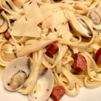 Chorizo & Clams Linguini · Thyme, garlic, chardonnay light cream sauce.