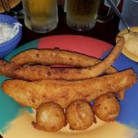 Catfish Fillet Dinner · Includes hushpuppies and your choice of side.