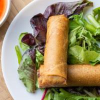 Pork Egg Roll · Pork, shredded carrots, onions and cabbage and wrapped in wheat paper served with traditiona...