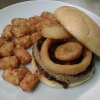 Cowboy Burger · 1/3 angus beef patty, onion rings, bacon, red sauce. Add fries and fountain drink $2.