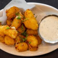 Wisconsin Cheese Curds · Battered, Fried and served with Ranch Dressing