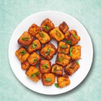 Zesty Cottage Cheese Bomb · A popular Indo Chinese dish with crispy pan fried Cottage cheese cubes, tossed in a spicy sa...