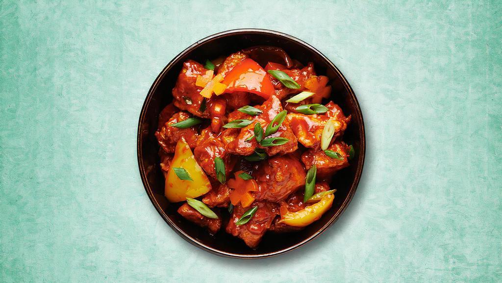 Zesty Chicken Bomb · A popular Indo-Chinese dish with crispy pan-fried chunks of chicken, tossed in a spicy sauce giving a tangy aftertaste.