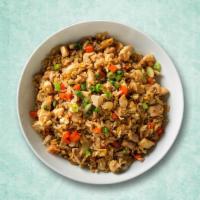 Wok Tossed Chicken Rice · A popular and flavoured rice recipe made with cooked rice, fried chunks of chicken, finely c...
