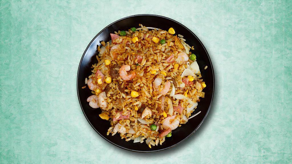 Wok Tossed Shrimp Rice · Tender seasoned shrimp stir fried with eggs, vegetables and rice.