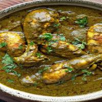 Chicken Saag · Boneless cubes of spring chicken, cooked to perfection with fresh spinach, onions, tomatoes,...