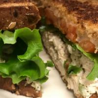 Chicken Salad Melt · Grilled multi-grain bread, swiss cheese, lettuce, and tomato and our own chicken salad.