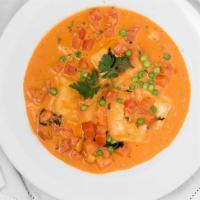 Lobster Ravioli · With Fresh shrimp and fresh peas in a vodka sauce.