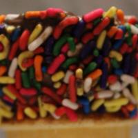 Chocolate Dipped With Sprinkles Cake Cone · Cake Cone Dipped in rich milk chocolate and rainbow sprinkles.