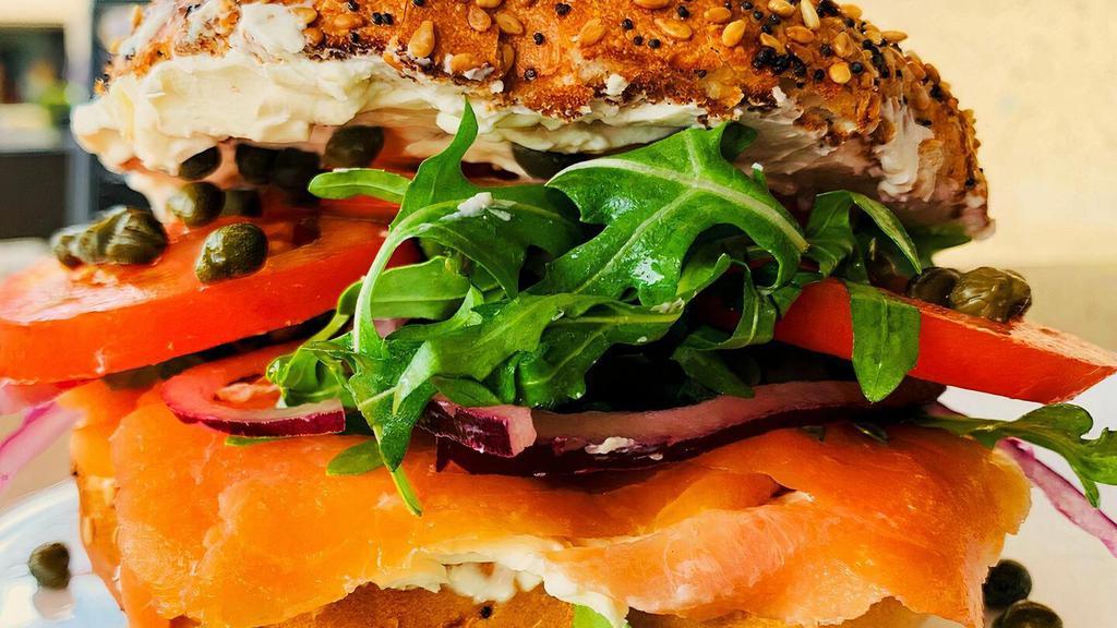 Lox Bagel · Nova Lox, Cream Cheese, Capers, Lettuce, Tomato, Red Onion and Mixed Greens on a choice of toasted bagel.