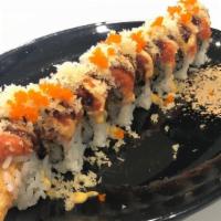 Dynamite Roll (9Pc.) · Shrimp Tempura topped with spicy tuna, eel sauce, spicy mayo, crunch, and masago