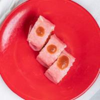 Ultimate Roll (9Pc.) · Salmon, tuna, yellowtail, white fish, avocado, masago in soy paper, hot sauce.