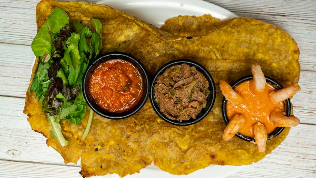 Patacon / 4 Combinaciones · Green plantain with 4 sides as your choice.