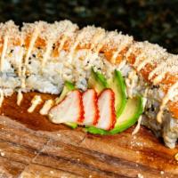 Springfield Roll · Spicy. Shrimp tempura krab, avocado, cream cheese, masago, topped with salmon and tempura fl...