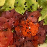 Tuna Tartar Sashimi · Spicy. Diced tuna, avocado, masago, scallions in a special spicy sauce and sesame seeds on t...