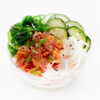 Spicy Tuna · Marinated with scallions and sriracha aioli
Toppings: Green onion, sweet onion, cucumber, se...