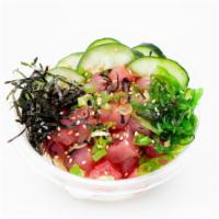 Ahi Tuna · Marinated with onions, hijiki, green onion, scallions, sweet shoyu, and sesame seeds
Topping...