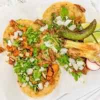 Taco Plate · One taco (beef or chicken). Served with Mexican rice and beans.