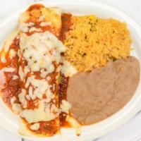 Burrito Plate · One burrito (beef or chicken). Served with Mexican rice and beans.