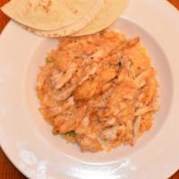Pollo Loco · Chicken breast served with rice, beans with melted cheese, corn or flour tortillas.