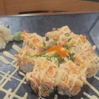 Volcano Roll · Cooked dynamite top over California roll.