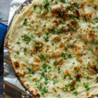 Garlic Naan · Recommended. Light flat bread stuffed with garlic and fresh green cilantro.